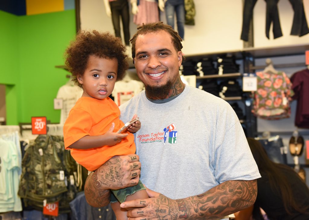 Mike Pouncey of the Miami Dolphins attended the Cool Gear for the School Year event as part of the Jason Taylor Foundation.