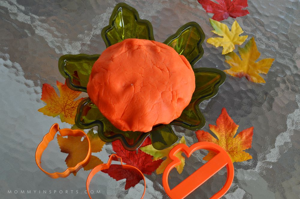 Pumpkin Playdough and fall leaves are the perfect after school activity!